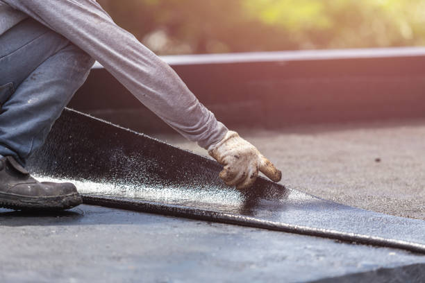 Professional Waterproofing technician working in Upper Darby, PA